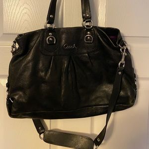 Black woman’s coach purse